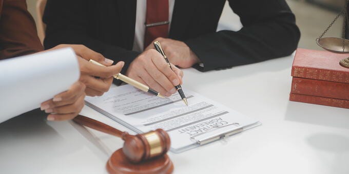 a person signing a document
